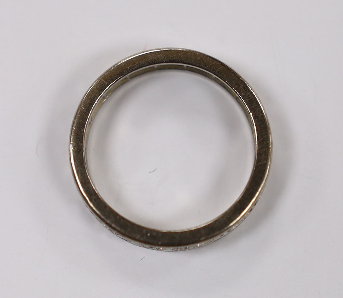 A 1970's 18ct white gold and diamond set full eternity ring, size N, gross weight 4.6 grams.